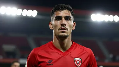 Rayo Vallecano, 16th in La Liga, faces FC Barcelona at Camp Nou with full-back Andrei Ratiu on the bench as his future is...