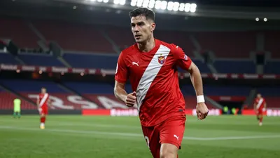 Rayo Vallecano face Barcelona at Camp Nou in La Liga as the club advances the sale of Andrei Ratiu to Fulham, according...